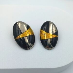 4/24$ 🌻 Vintage oval shaped black, gold, and silver clip on earrings retro